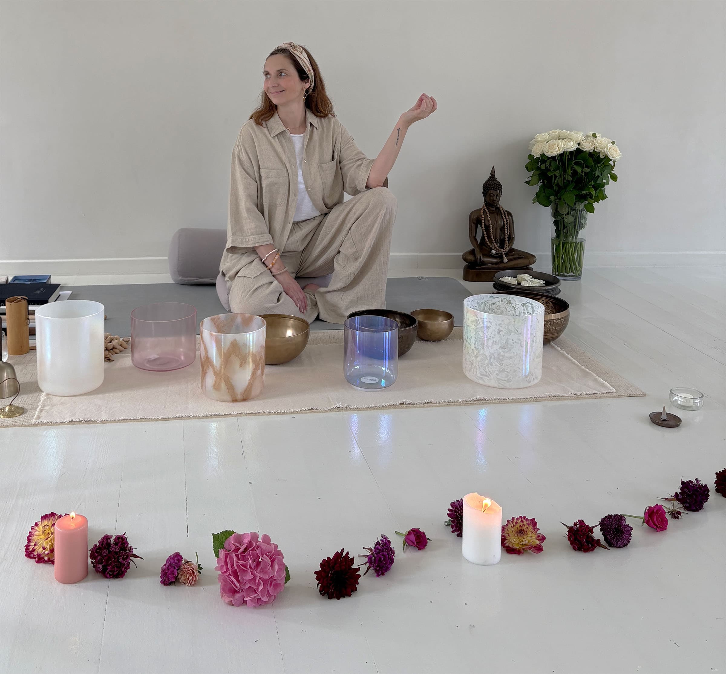 Gabi playing an alchemy crystal singing bowl