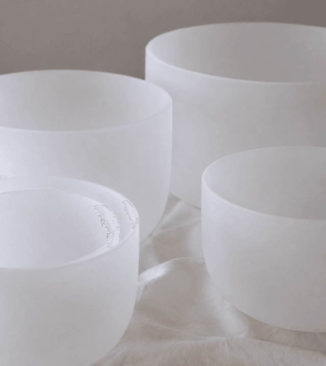 Closeup of Stella set frosted white crystal singing bowls
